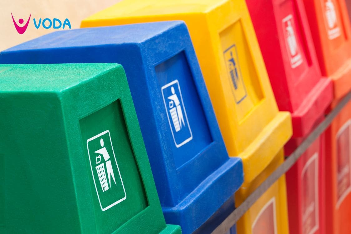 Row of brightly coloured recycling bins