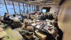 North of Tyne Volunteering Event Large group of people in a room watching a presentation.